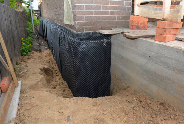 SJ Waterproofing Pros technician performing targeted Interior Drainage System assessment in Frenchtown, NJ